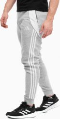 Adidas Spodnie męskie adidas Tiro 24 Sweat szare IS2153 2XL. Szare długie spodnie sportowe męskie ADIDAS, bez wzorów. Za 236.71 zł.