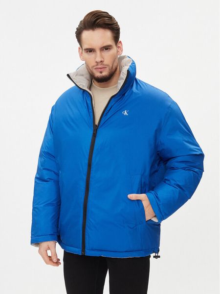 Calvin Klein Jeans Kurtka zimowa 90's J30J324438 Niebieski Oversize. Niebieskie kurtki męskie Calvin Klein Jeans, na zimę, m, bez wzorów, z jeansu, bez ramiączek, bez kaptura. Za 679.99 zł.