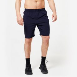 Spodenki fitness cardio męskie Domyos. Niebieskie szorty sportowe męskie DOMYOS, bez wzorów, z elastanu, sportowe. Za 49.99 zł.