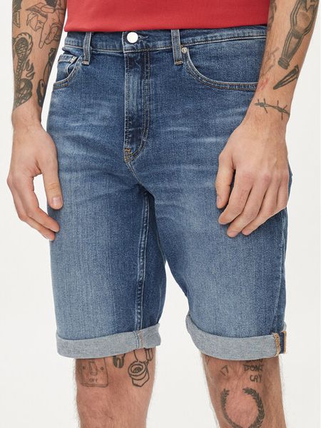 Calvin Klein Jeans Szorty jeansowe J30J324874 Niebieski Slim Fit. Niebieskie szorty męskie Calvin Klein Jeans, bez wzorów, z bawełny. Za 299.99 zł.