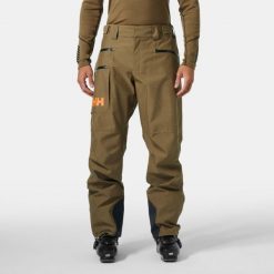 Spodnie narciarskie Helly Hansen Garibaldi 2.0. Brązowe spodnie narciarskie i snowboardowe męskie Helly Hansen, bez wzorów, narciarskie. W wyprzedaży za 1,100.50 zł.