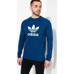Adidas Bluza Trefoil Crew Adicolor , niebieski, rozmiar L. Niebieskie bluzy nierozpinane męskie ADIDAS, l, bez wzorów, z bawełny, bez ramiączek, bez kaptura. W wyprzedaży za 169.99 zł.