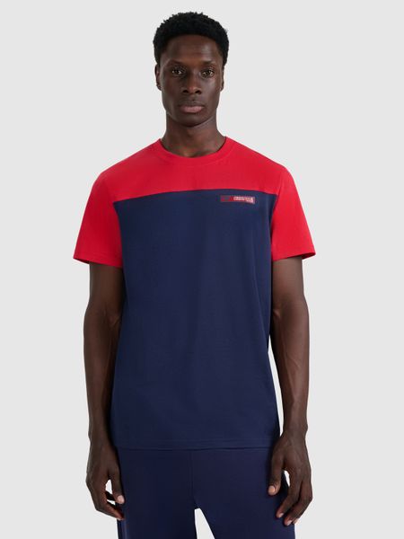 4F T-shirt regular z nadrukiem męski - granatowy S. Niebieskie t-shirty męskie 4f, m, bez wzorów, bez kołnierzyka, bez ramiączek. W wyprzedaży za 49.99 zł.