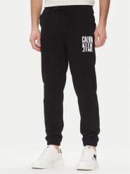 Calvin Klein Jeans Spodnie dresowe Painted J30J327535 Czarny Regular Fit. Czarne spodnie dresowe męskie Calvin Klein Jeans, bez wzorów, z bawełny. Za 239.99 zł.