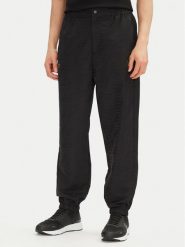 EA7 Emporio Armani Spodnie dresowe 7M000264 AF13722 UC001 Czarny Modern Fit. Czarne spodnie dresowe męskie EA7 Emporio Armani, bez wzorów, z dresówki. Za 409.99 zł.