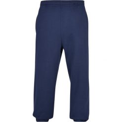Spodnie dresowe Urban Classics GT. Niebieskie spodnie na co dzień męskie Urban Classics, bez wzorów, z dresówki, casualowe, długie. Za 169.80 zł.
