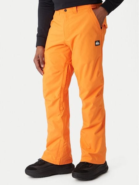 Quiksilver Spodnie snowboardowe Estate EQYTP03237 Pomarańczowy Slim Fit. Brązowe spodnie narciarskie i snowboardowe męskie Quiksilver, bez wzorów, z syntetyku, narciarskie. Za 649.99 zł.