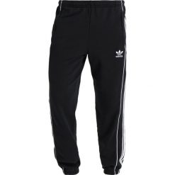 Adidas Originals PIPE Spodnie treningowe black/white. Czarne spodnie dresowe męskie Adidas Originals, z bawełny. Za 359.00 zł.