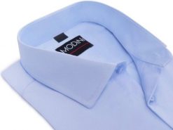 Błękitna/niebieska gładka koszula męska Y72. Niebieskie koszule męskie Modini Moda Męska, m, bez wzorów, z bawełny, bez kołnierzyka, bez ramiączek. W wyprzedaży za 169.20 zł.