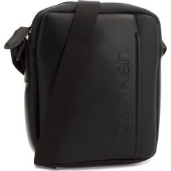 Saszetka CALVIN KLEIN - Elevated Logo Mini Reporter K50K503883 001. Saszetki męskie marki Calvin Klein. W wyprzedaży za 249.00 zł.