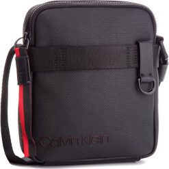 Saszetka CALVIN KLEIN - City Active Mini Reporter K50K503920 910. Saszetki męskie marki Calvin Klein. W wyprzedaży za 269.00 zł.