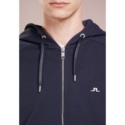 J.LINDEBERG THROW ZIP HOOD RING LOOP Bluza rozpinana navy. Niebieskie bluzy rozpinane męskie J.LINDEBERG, z bawełny. Za 539.00 zł.