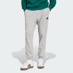 Spodnie Essentials Feel Cozy French Terry. Czarne spodnie dresowe męskie ADIDAS, bez wzorów, z dresówki. Za 229.00 zł.