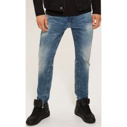 Jeansy slim fit - Niebieski. Niebieskie jeansy męskie House, z jeansu. Za 129.99 zł.
