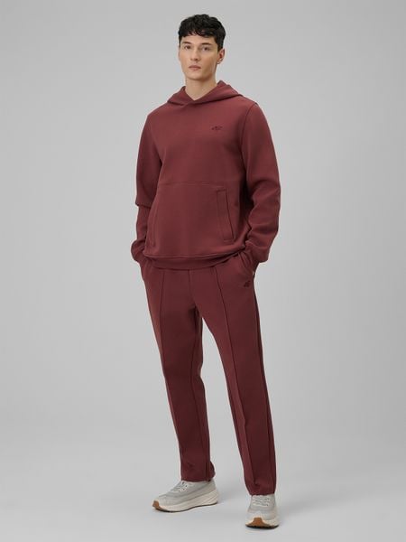 4F Spodnie dresowe męskie - burgundowe L. Czerwone spodnie dresowe męskie 4f, bez wzorów, z bawełny. Za 199.99 zł.