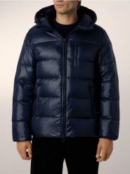 Pikowana kurtka z puchem - granatowy. Niebieskie kurtki męskie Reserved, l, bez wzorów, z puchu, bez ramiączek, bez kaptura. Za 499.99 zł.