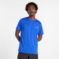 Koszulka męska New Balance MT41222BUM – niebieska. Niebieskie t-shirty sportowe męskie New Balance, m, bez wzorów, z materiału, sportowe, bez ramiączek. Za 149.99 zł.