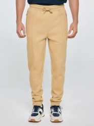 Spodnie męskie dresowe beżowe Wladorp 801. Brązowe spodnie dresowe męskie Big Star, bez wzorów, z dresówki. Za 199.99 zł.
