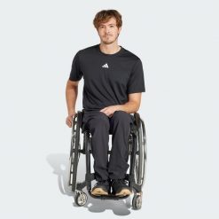 Spodnie Adaptive. Czarne długie spodnie sportowe męskie ADIDAS, bez wzorów, z materiału, na fitness i siłownię. Za 329.00 zł.