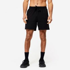 Spodenki fitness męskie Domyos 100. Czarne szorty sportowe męskie DOMYOS, bez wzorów, z bawełny, eleganckie. Za 29.99 zł.