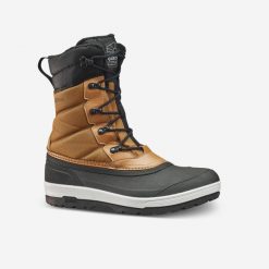 Śniegowce turystyczne męskie Quechua NH500 wodoodporne. Brązowe buty trekkingowe męskie QUECHUA, na zimę, bez wzorów, sportowe, bez obcasa, bez zapięcia. W wyprzedaży za 139.99 zł.