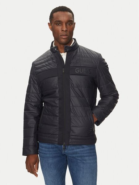 Guess Kurtka przejściowa M4YL16 WFHD0 Granatowy Regular Fit. Niebieskie kurtki męskie Guess, m, z aplikacjami, ze skóry, bez ramiączek, bez kaptura. Za 419.99 zł.