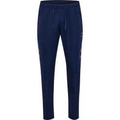 Spodnie treningowe Hummel Cima 2.0. Niebieskie szorty sportowe męskie HUMMEL, bez wzorów, sportowe. Za 212.50 zł.