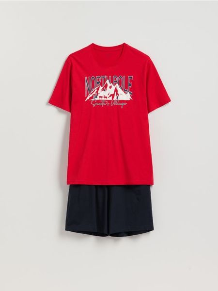 Dwuczęściowa piżama z nadrukiem - czerwony. Czerwone piżamy męskie Reserved, l, bez wzorów, z bawełny, bez kołnierzyka, bez ramiączek. Za 99.99 zł.