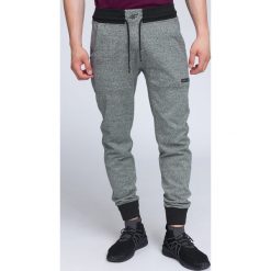 Spodnie dresowe męskie SPMD004 - czarny. Spodnie dresowe męskie marki 4f. W wyprzedaży za 139.99 zł.