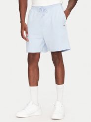 Tommy Jeans Szorty sportowe Entry GraphicDM0DM21369 Błękitny Regular Fit. Niebieskie szorty sportowe męskie Tommy Jeans, bez wzorów, z bawełny, sportowe. Za 129.99 zł.