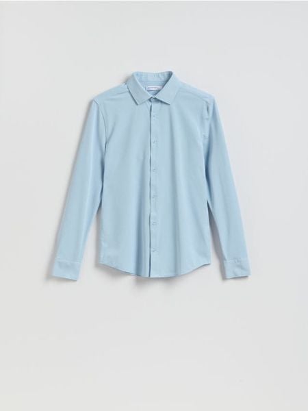 Koszula super slim fit - jasnoniebieski. Niebieskie koszule męskie Reserved, l, bez wzorów, z dzianiny, bez kołnierzyka, bez ramiączek. Za 119.99 zł.