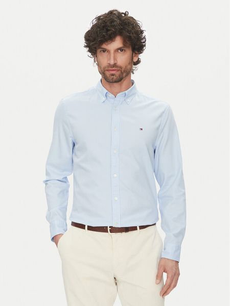Tommy Hilfiger Koszula MW0MW38556 Błękitny Slim Fit. Niebieskie koszule męskie Tommy Hilfiger, m, bez wzorów, z bawełny, bez kołnierzyka, bez ramiączek. Za 219.99 zł.