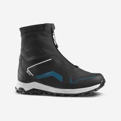 Buty turystyczne męskie Quechua SH900 Pro mountain Mid wodoodporne. Niebieskie buty trekkingowe męskie QUECHUA, na zimę, bez wzorów, sportowe, bez obcasa, bez zapięcia. Za 599.99 zł.