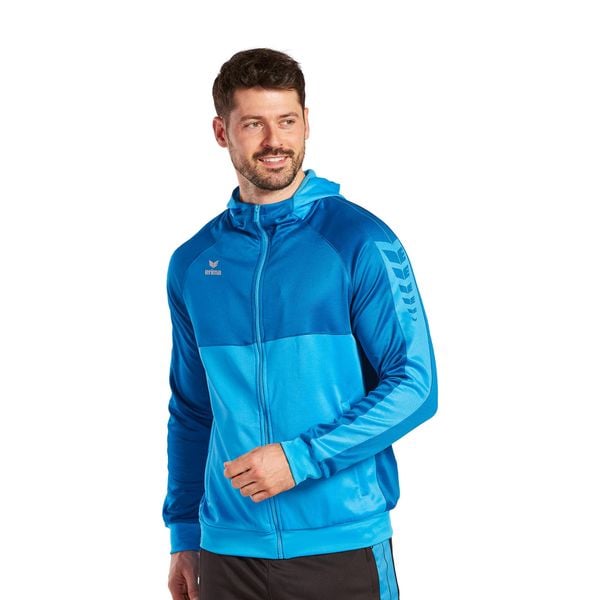 Kurtka treningowa z kapturem Erima Six Wings. Fioletowe kurtki męskie Erima, bez wzorów, eleganckie, bez ramiączek, z kapturem. Za 250.00 zł.