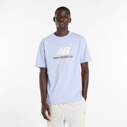 Koszulka męska New Balance MT51500DYK – niebieska. Niebieskie t-shirty sportowe męskie New Balance, l, bez wzorów, z bawełny, klasyczne, bez ramiączek. Za 169.99 zł.