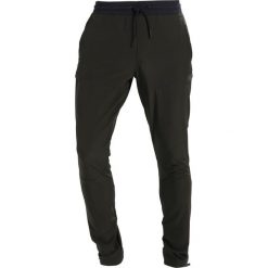 Under Armour SPORTSTYLE ELITE Spodnie materiałowe artillery green. Długie spodnie sportowe męskie marki Under Armour. Za 419.00 zł.