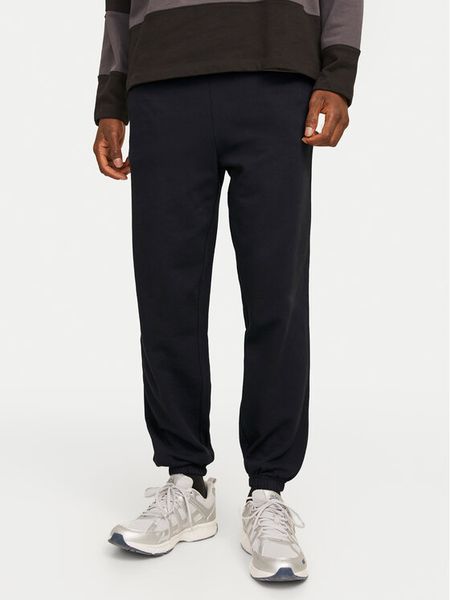 Jack & Jones Spodnie dresowe Morgan 12257964 Czarny Regular Fit. Czarne spodnie dresowe męskie Jack & Jones, bez wzorów, z bawełny. Za 99.99 zł.