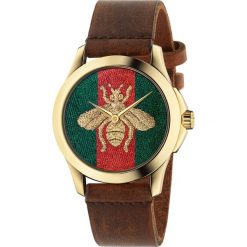 ZEGAREK GUCCI Le Marche des Merveilles YA126451. Brązowe zegarki męskie GUCCI, z materiału. Za 3,590.00 zł.