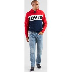 Dżinsy "502" - Regular Fit - w kolorze błękitnym. Niebieskie jeansy męskie Denim Special, z aplikacjami, klasyczne. W wyprzedaży za 265.95 zł.