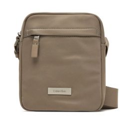 Saszetka Calvin Klein. Brązowe saszetki męskie Calvin Klein, bez wzorów, młodzieżowe, małe. Za 299.99 zł.