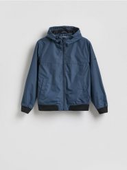 Kurtka wiatrówka z podszewką - granatowy. Niebieskie kurtki męskie Reserved, l, bez wzorów, z tkaniny, bez ramiączek, bez kaptura. Za 149.99 zł.