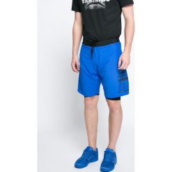 Reebok - Szorty. Szare szorty sportowe męskie Reebok, z elastanu, sportowe. W wyprzedaży za 129.90 zł.
