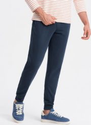 Ombre Bawełniane męskie spodnie dresowe joggery BASIC granatowe V1 OM-PABS-0174 L. Długie spodnie sportowe męskie Ombre, bez wzorów, z bawełny. Za 129.99 zł.