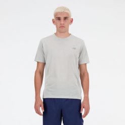 Koszulka męska New Balance MT41253AG – szara. Szare t-shirty sportowe męskie New Balance, m, bez wzorów, z materiału, sportowe, bez ramiączek. Za 199.99 zł.