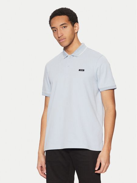 Calvin Klein Polo K10K114141 Niebieski Regular Fit. Niebieskie koszulki polo męskie Calvin Klein, l, bez wzorów, z bawełny, bez kołnierzyka, bez ramiączek. Za 199.99 zł.