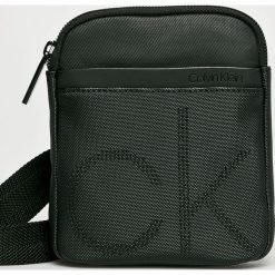 Calvin Klein - Saszetka. Czarne saszetki męskie marki Calvin Klein, w paski, z bawełny. Za 269.90 zł.
