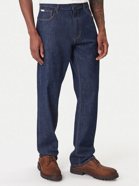 Guess Jeans Jeansy M6RA1B D002G Granatowy Relaxed Fit. Niebieskie jeansy męskie Guess Jeans, z aplikacjami, z bawełny. Za 349.00 zł.