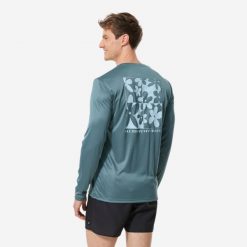 Koszulka UV surfingowa męska Decathlon Water T-shirt Cutyflow długi rękaw. Brązowe koszulki męskie z długim rękawem Decathlon, l, bez wzorów, z dzianiny, sportowe, bez kołnierzyka, bez ramiączek. Za 59.99 zł.