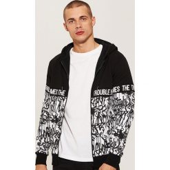 Wzorzysta bluza - Czarny. Bluzy nierozpinane męskie marki DOMYOS. W wyprzedaży za 69.99 zł.