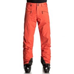 Quiksilver BOUNDRY Spodnie narciarskie mandarin red. Czerwone spodnie narciarskie i snowboardowe męskie Quiksilver, z materiału. W wyprzedaży za 441.35 zł.